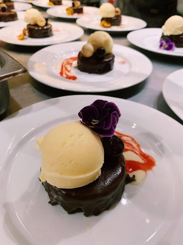 a table topped with plates of food on a plate