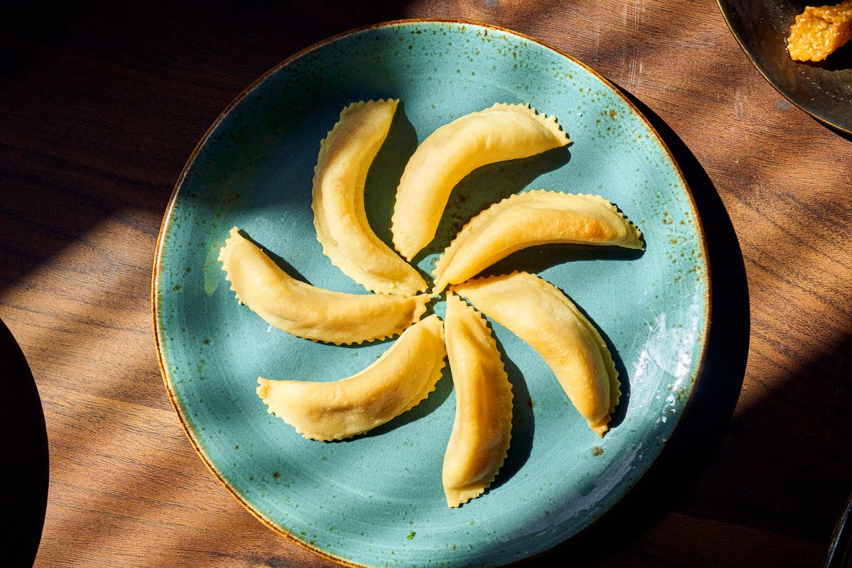 a plate with empanadas