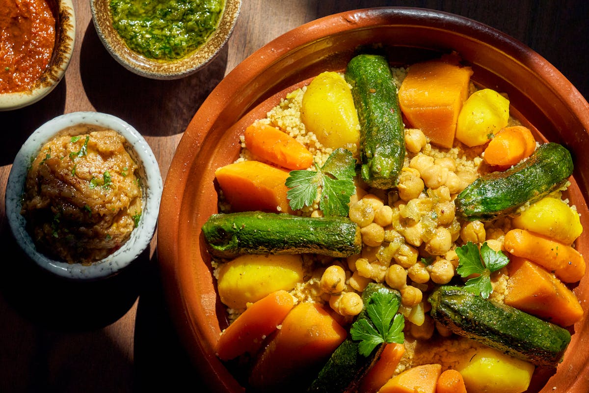 a bowl filled with meat and vegetables