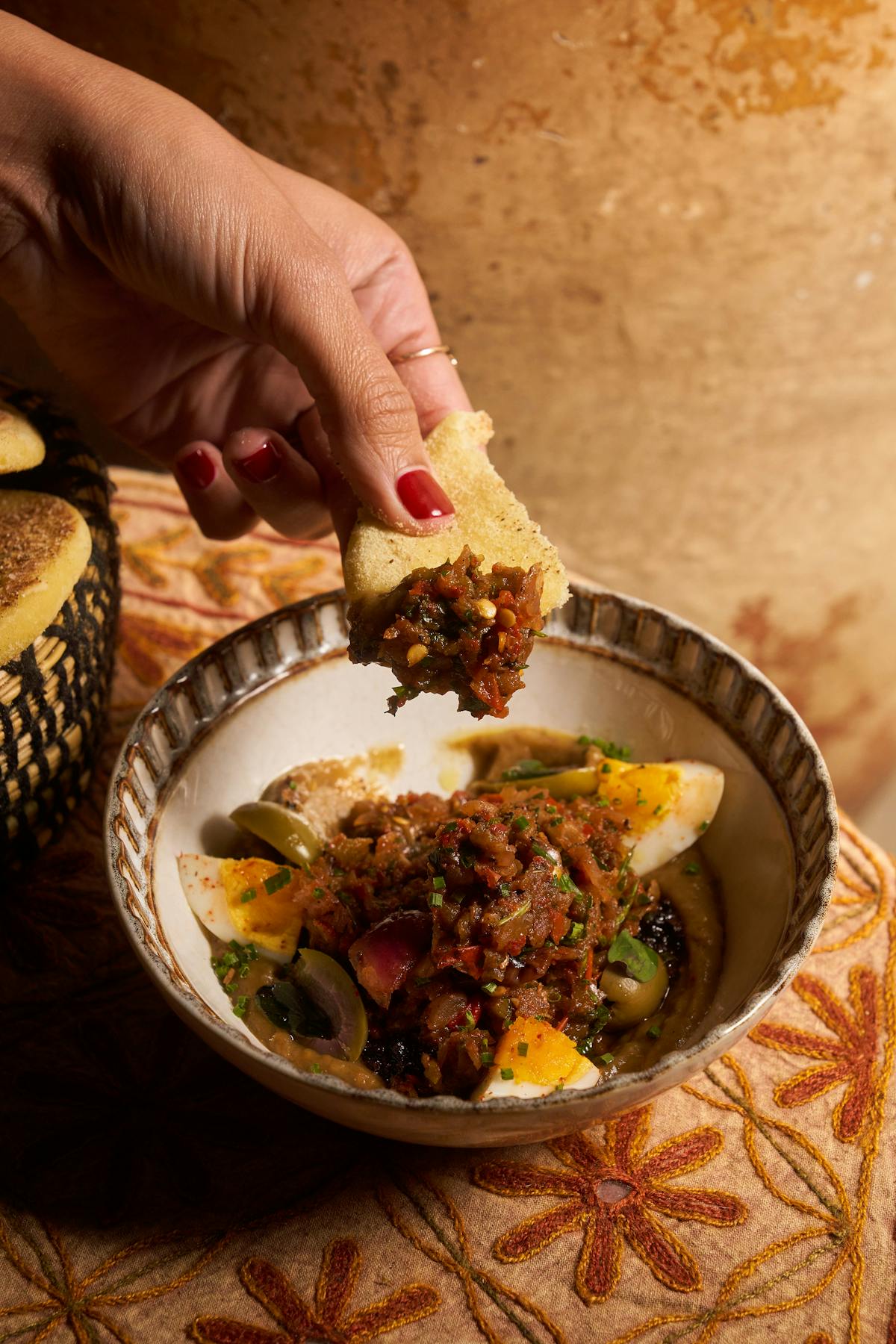 a person holding a plate of food