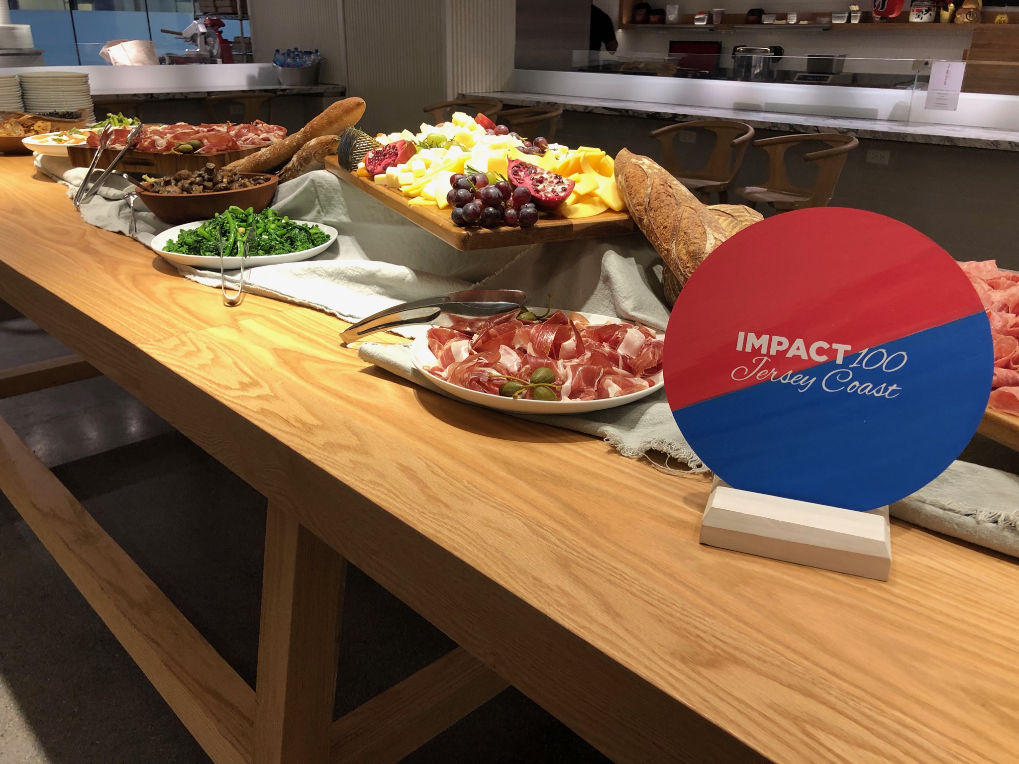 a pizza sitting on top of a wooden table