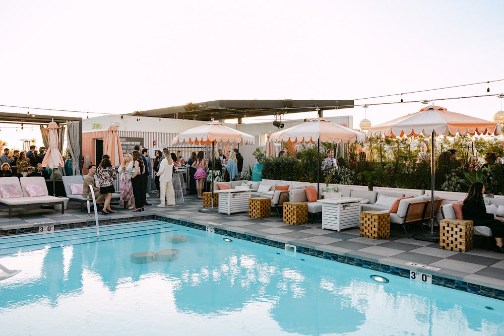 a group of people sitting at a table in a room
