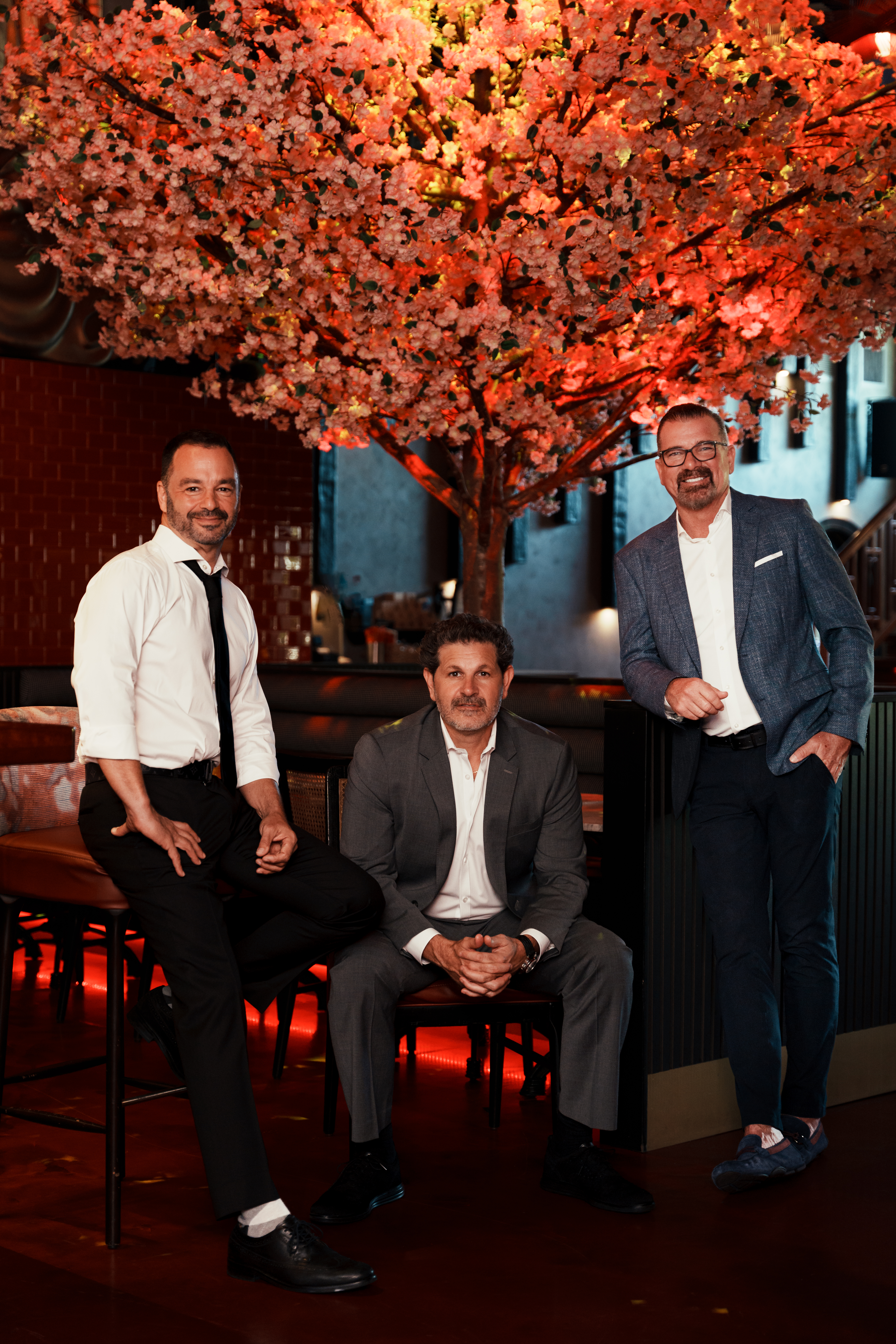 a group of people posing for the camera