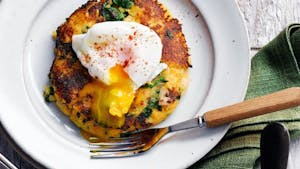 a plate with a poached egg on it