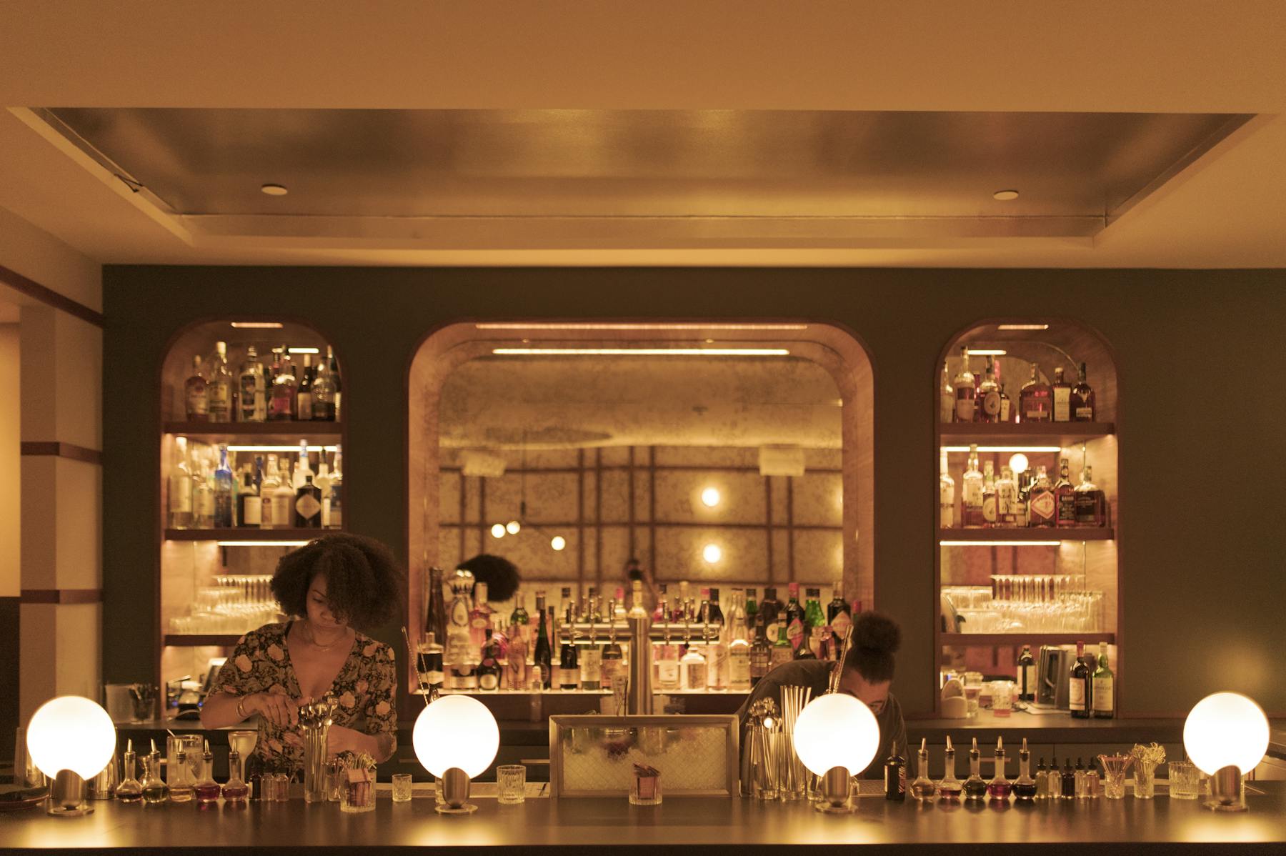 a person sitting at a table in a restaurant