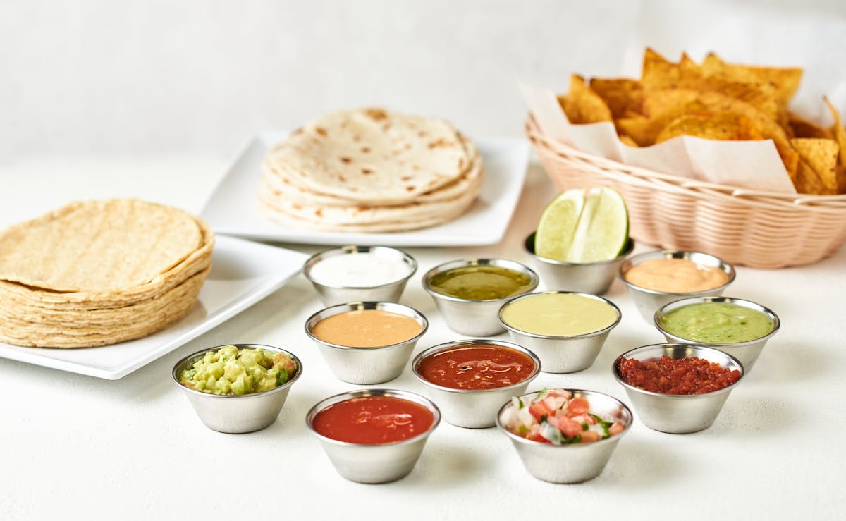 a table topped with plates of food on a plate