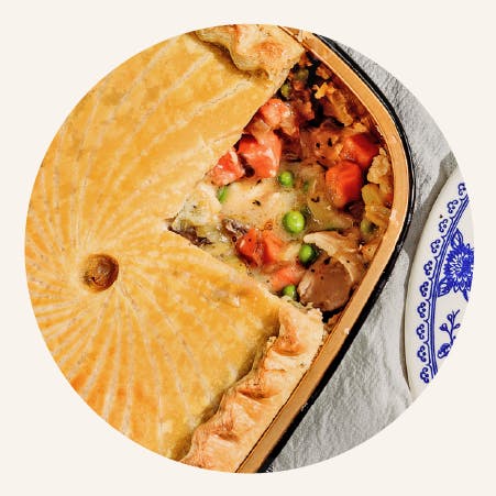 a slice of pizza on a paper plate