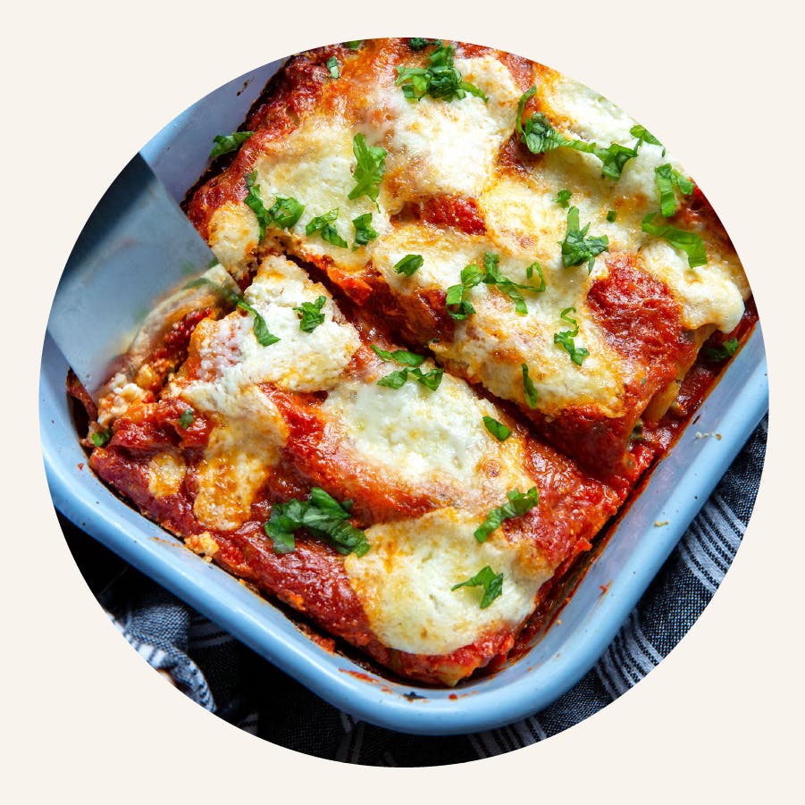 a plate of food with a slice of pizza