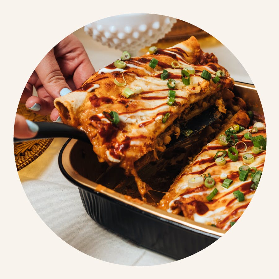 a plate of food with a slice of pizza