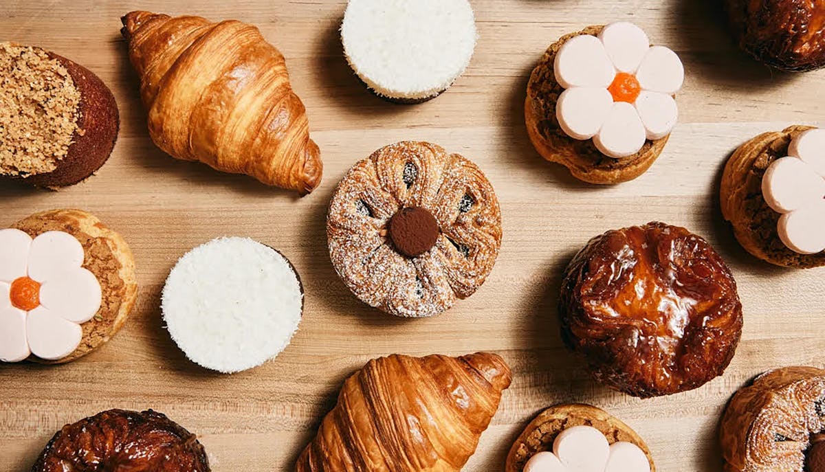 a bunch of food sitting on top of a wooden table