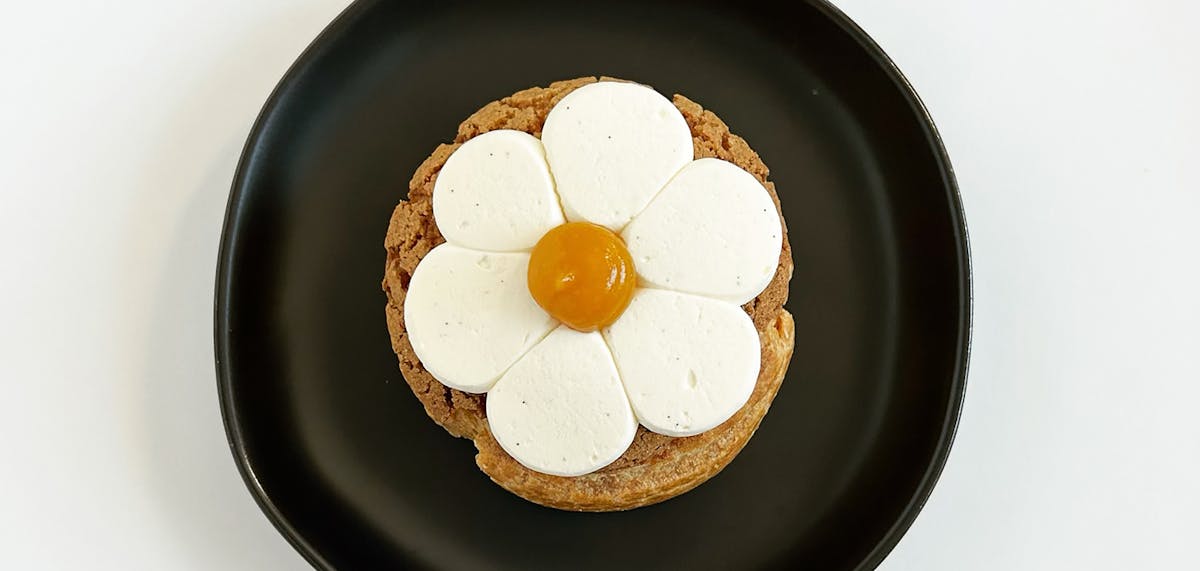 a brown egg on a plate