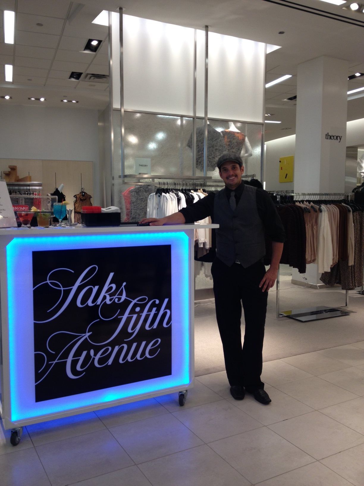 Events lighting highlighting an illuminated bar setup with professional bartender service