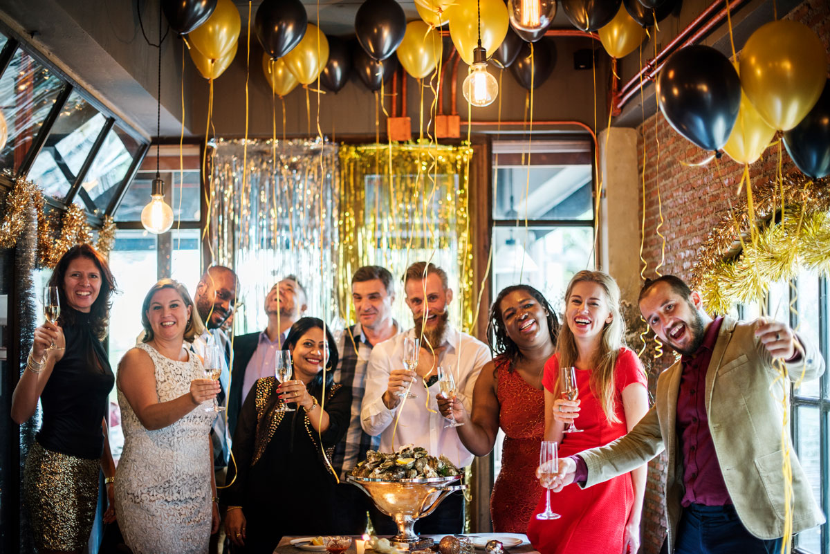 Employees toasting at a corporate event.