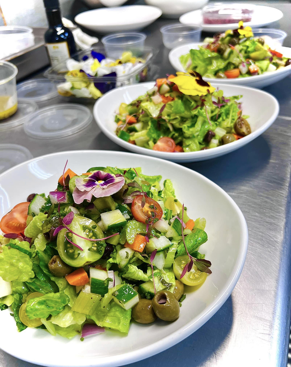 A plate of vegan-friendly food as a result of vegan catering.