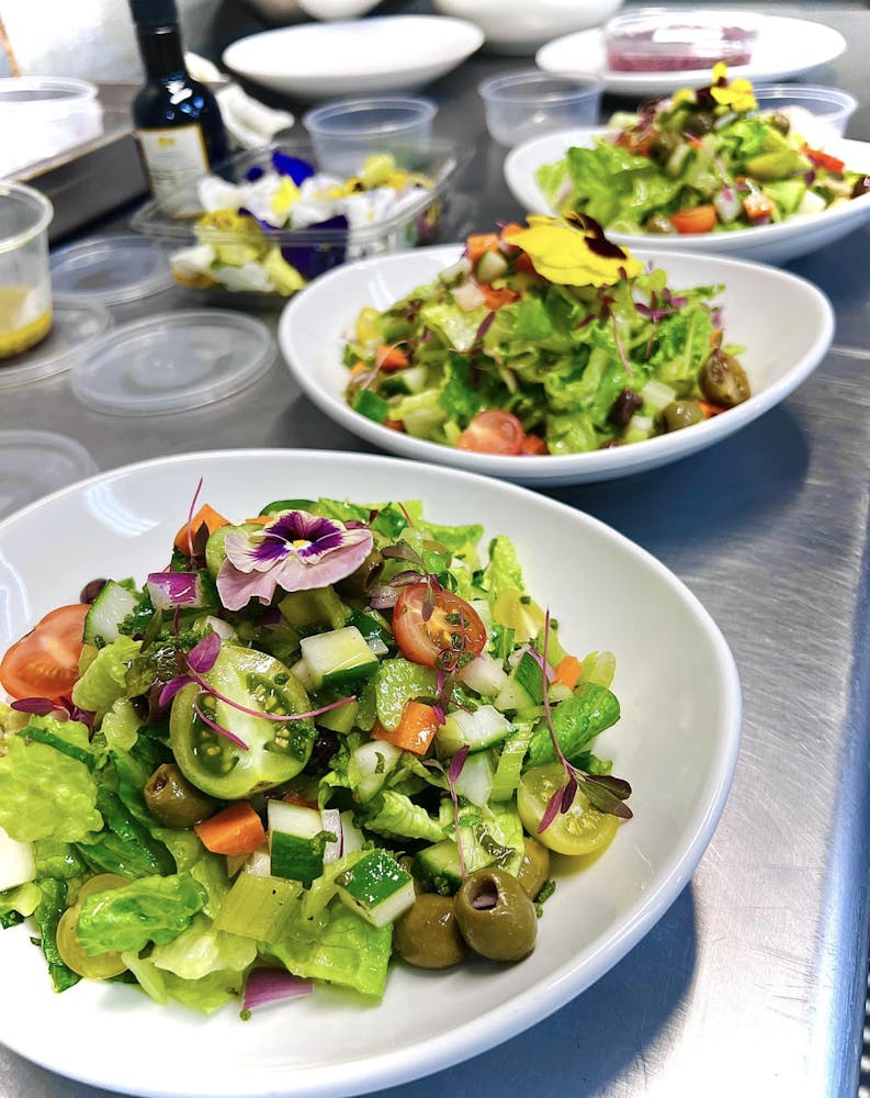 A plate of vegan-friendly food as a result of vegan catering.