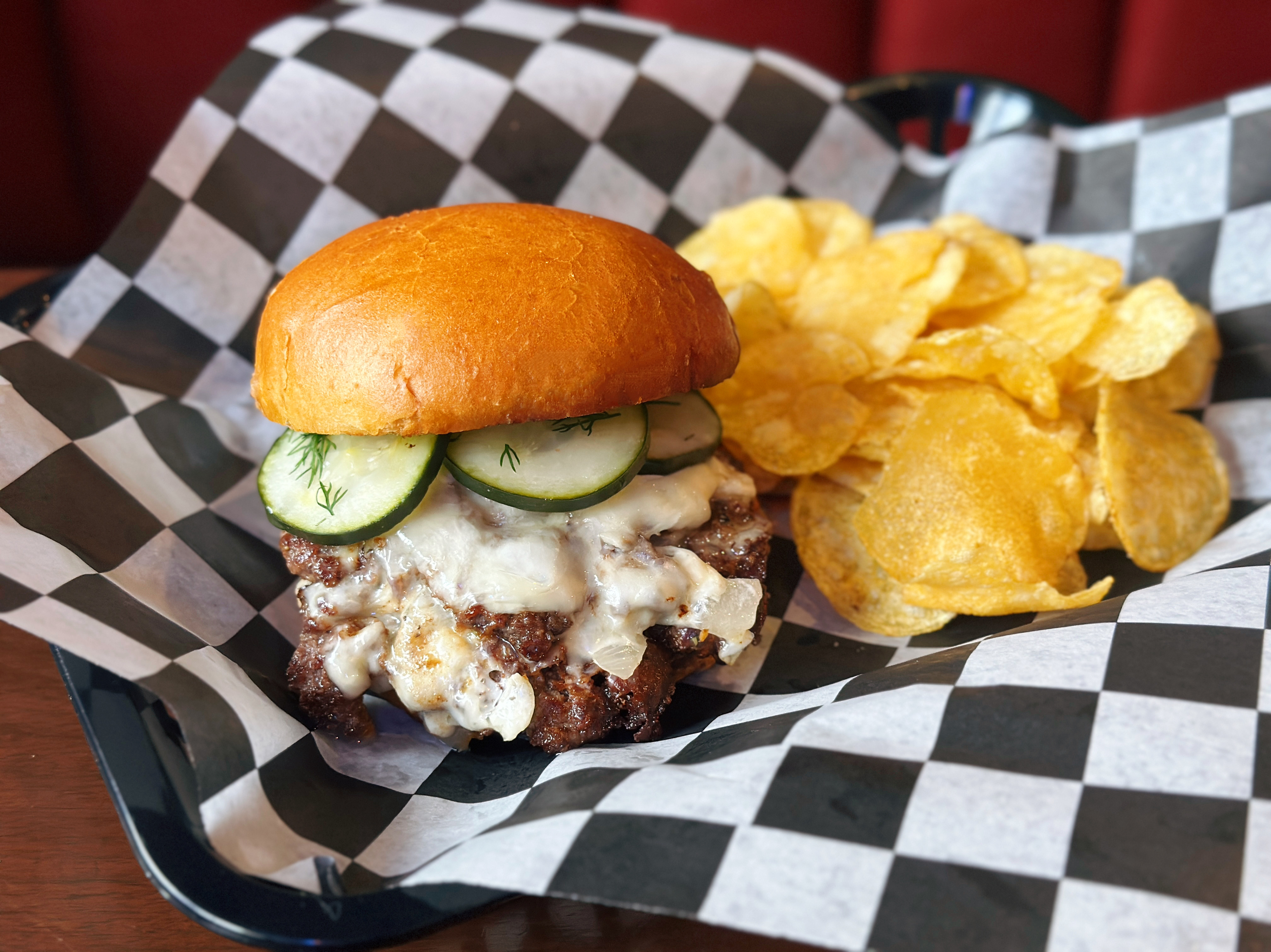 a sandwich sitting on top of a paper plate