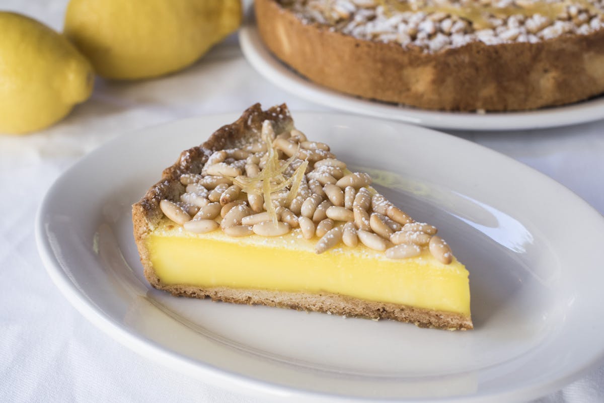 Maialino's torta della nonna with lemon custard and pine nuts