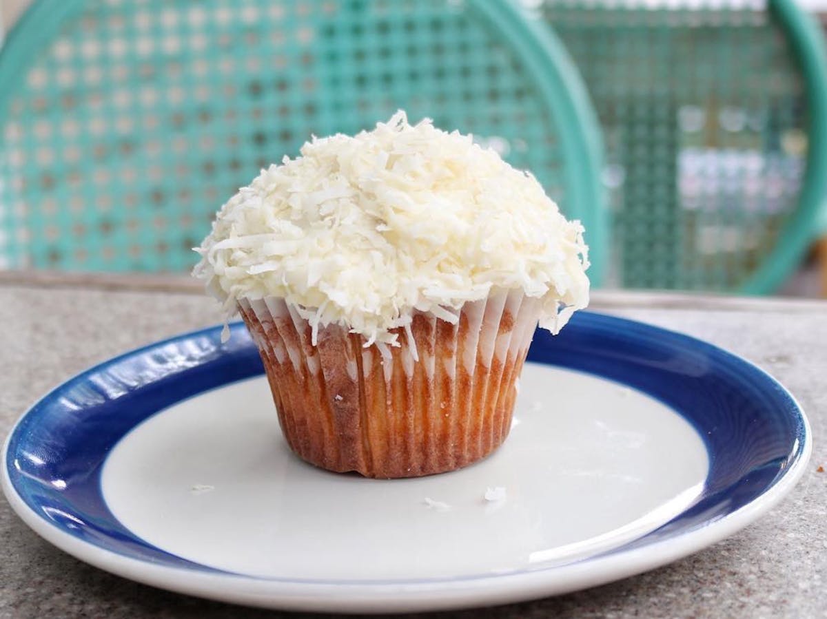 a blue and white cake on a plate