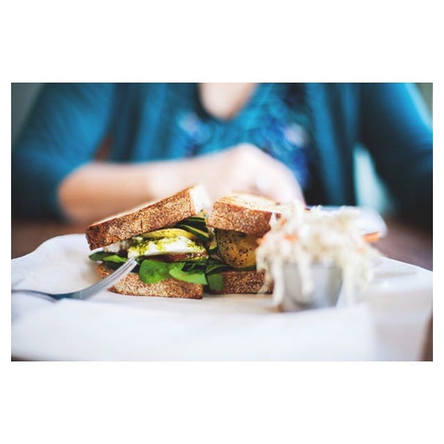 a sandwich cut in half on a plate