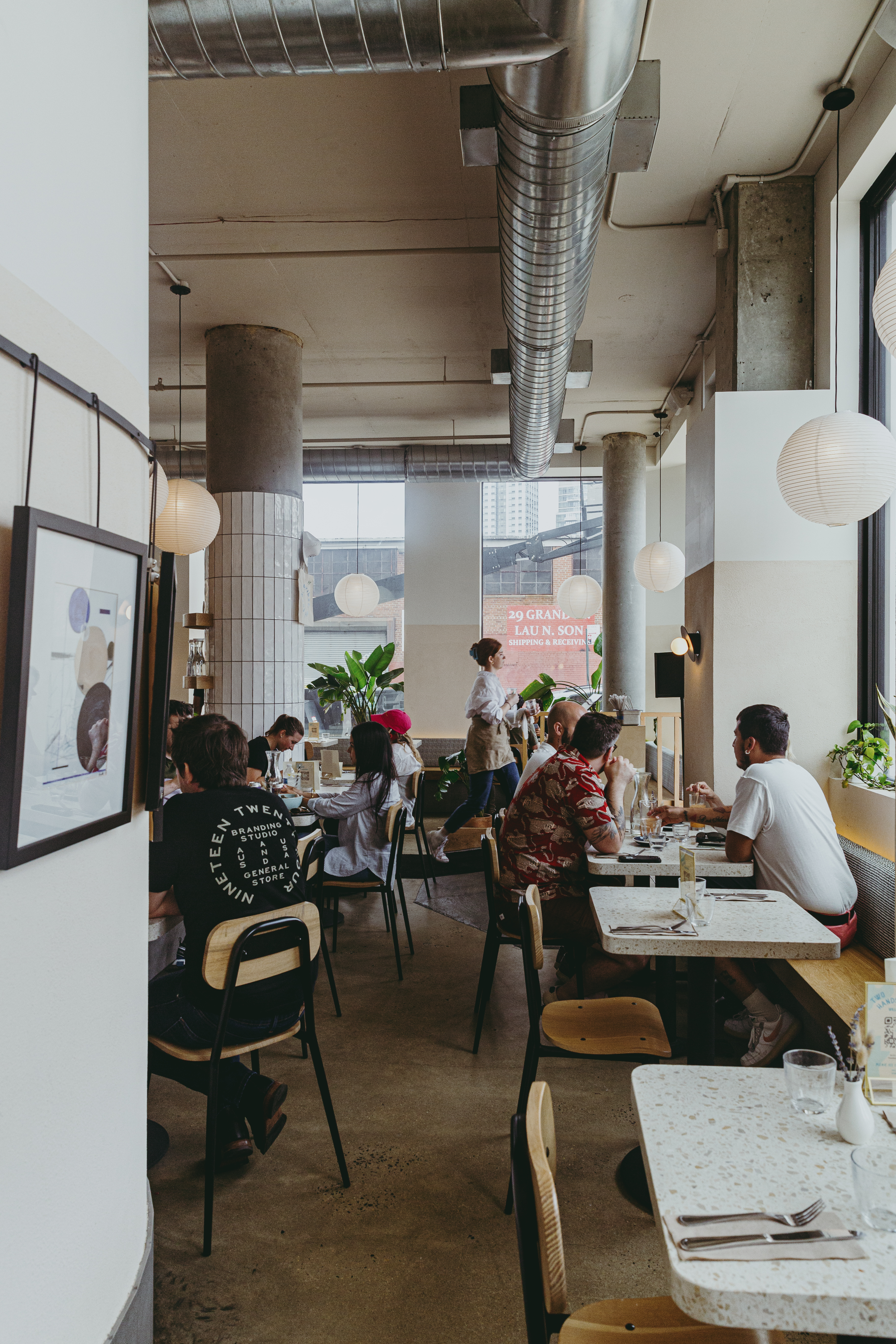 a group of people sitting at a table in a room
