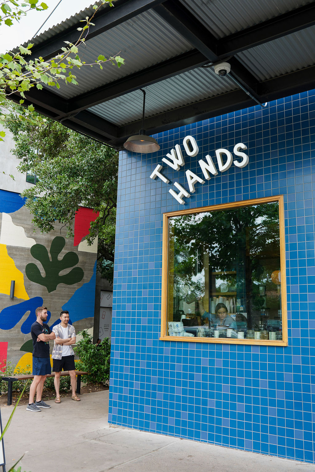a group of people standing in front of a building