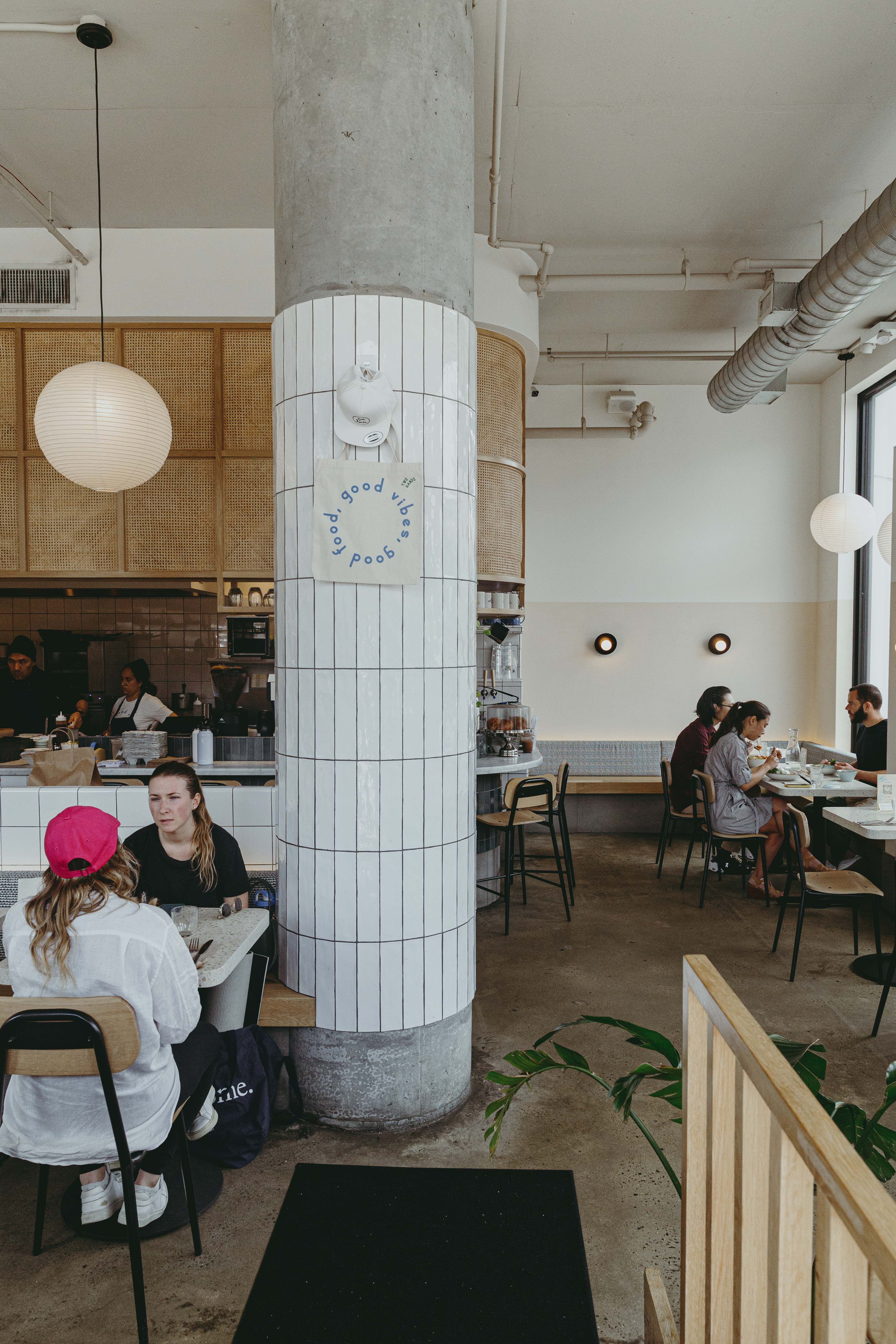 a group of people sitting in a chair in a room