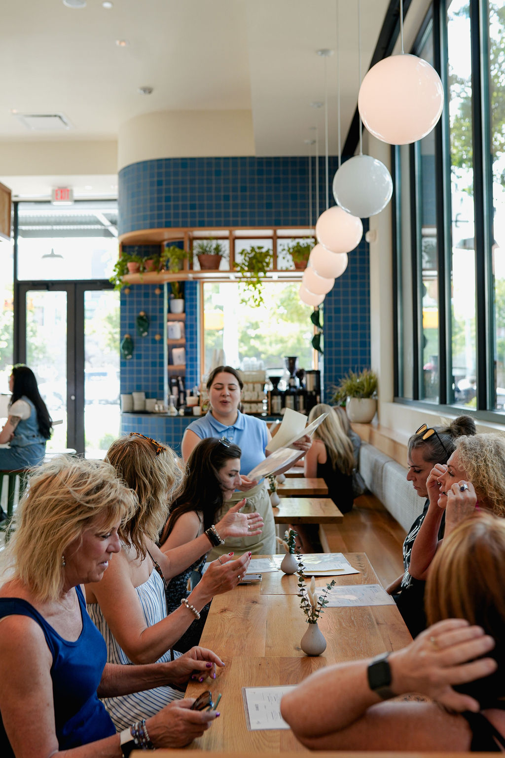 a group of people sitting at a table