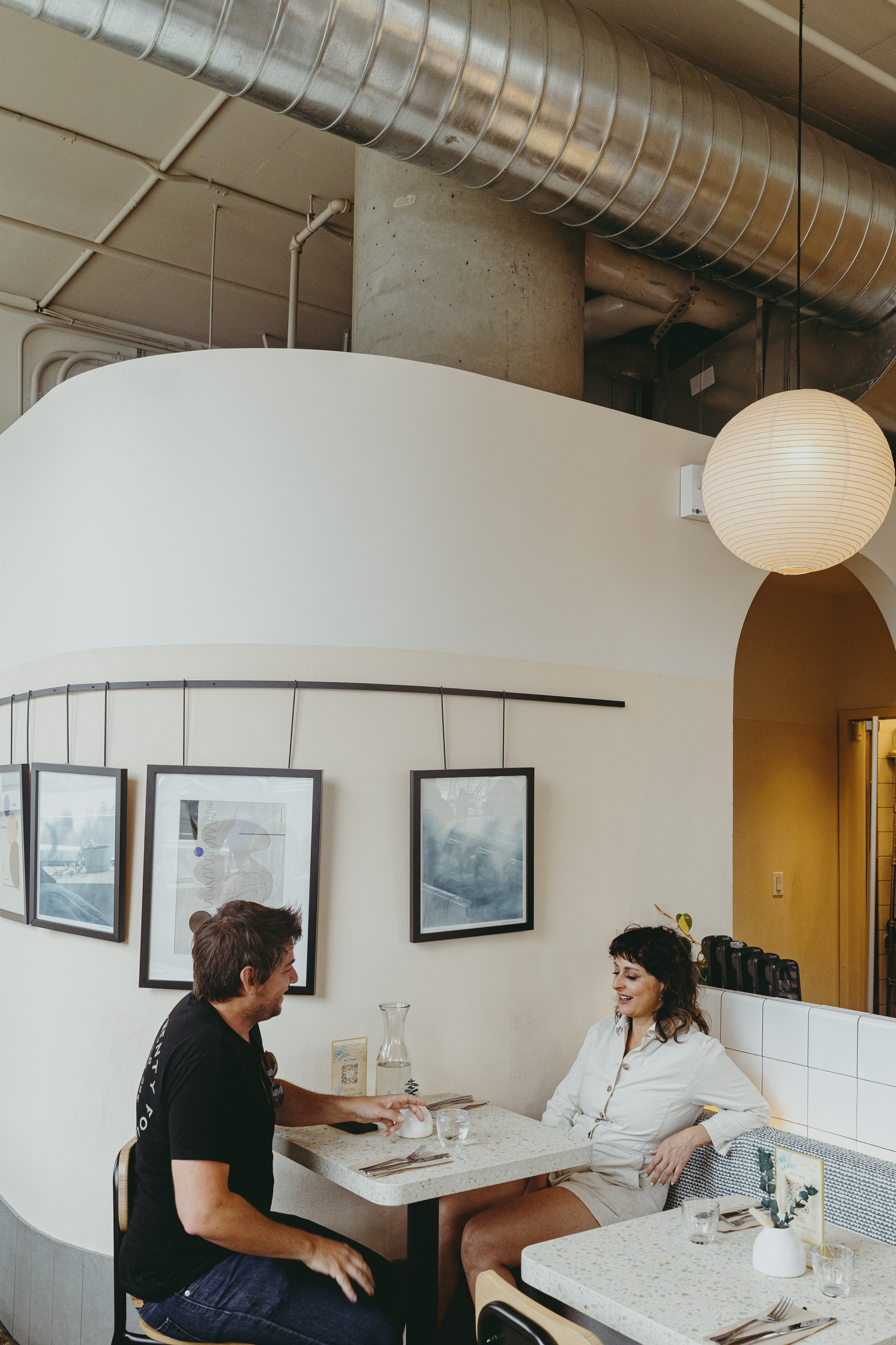 a man and a woman standing in a room