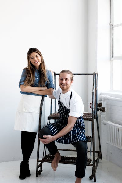 a man and a woman posing for a picture