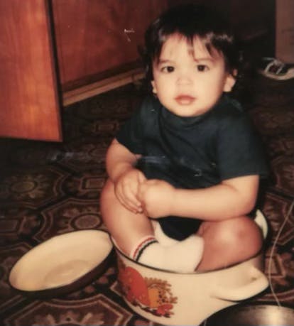 a small child sitting on a table