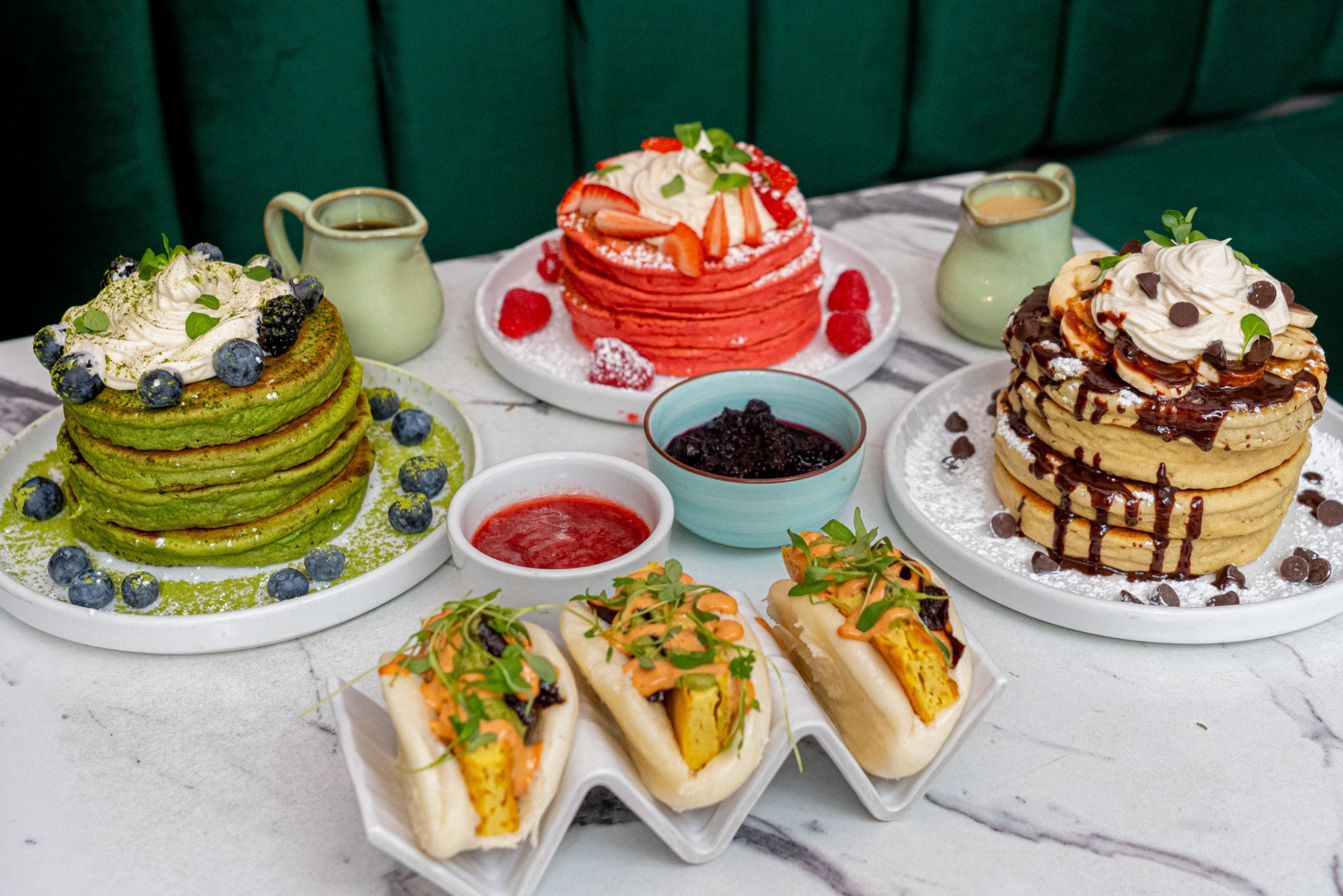 a table topped with plates of food on a plate