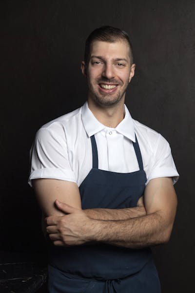 a man wearing a white shirt