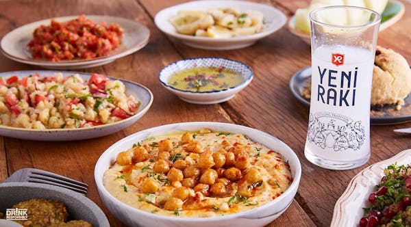 a plate full of food sitting on a table