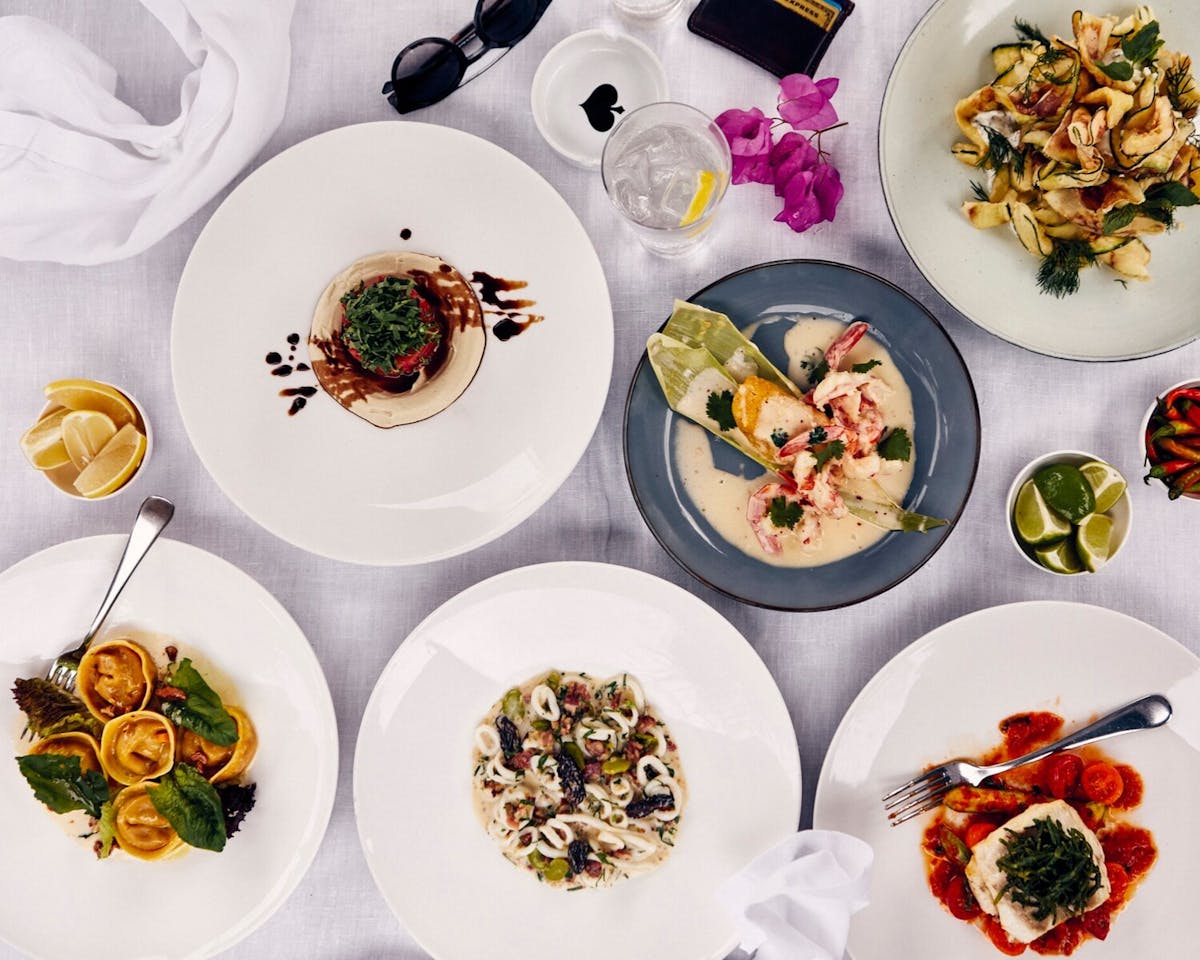 a table topped with different types of food on a plate