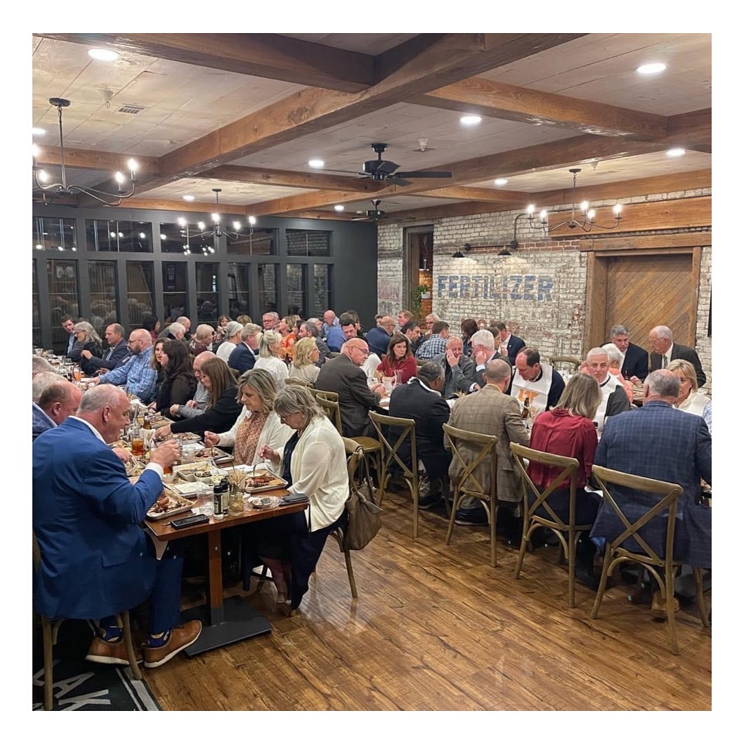a group of people in a room