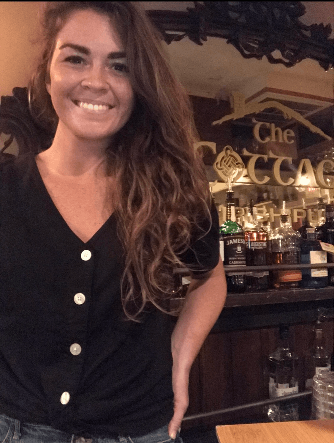 a woman smiling for the camera