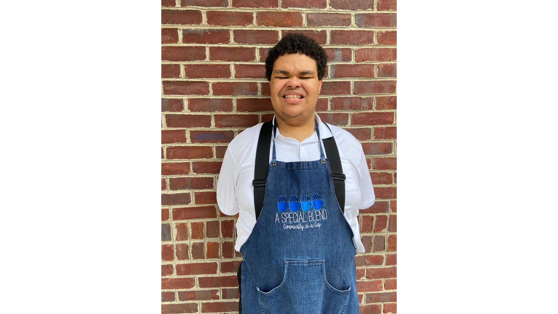 a person standing posing for the camera