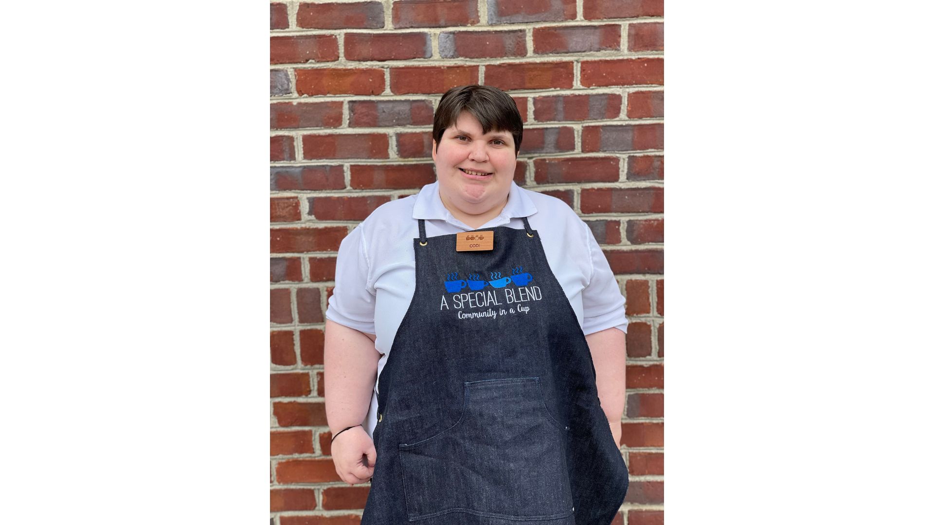 a person standing posing for the camera