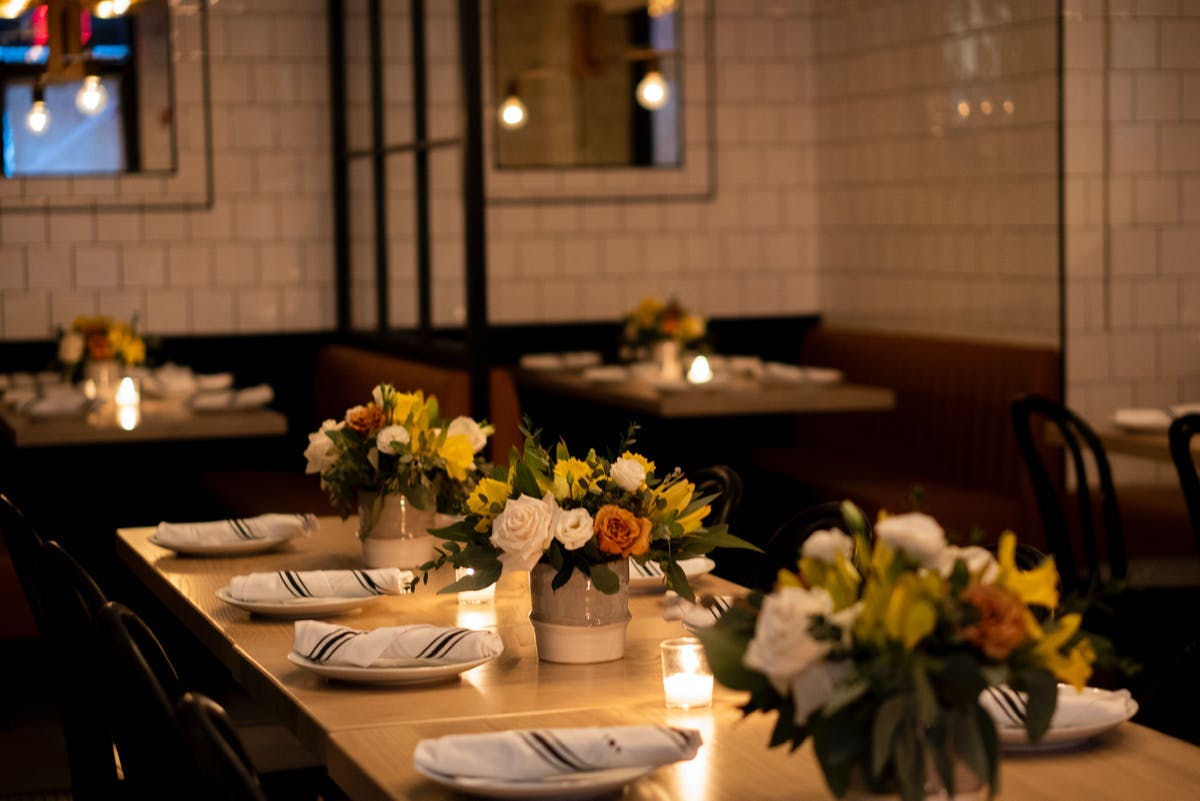 a vase of flowers on a table