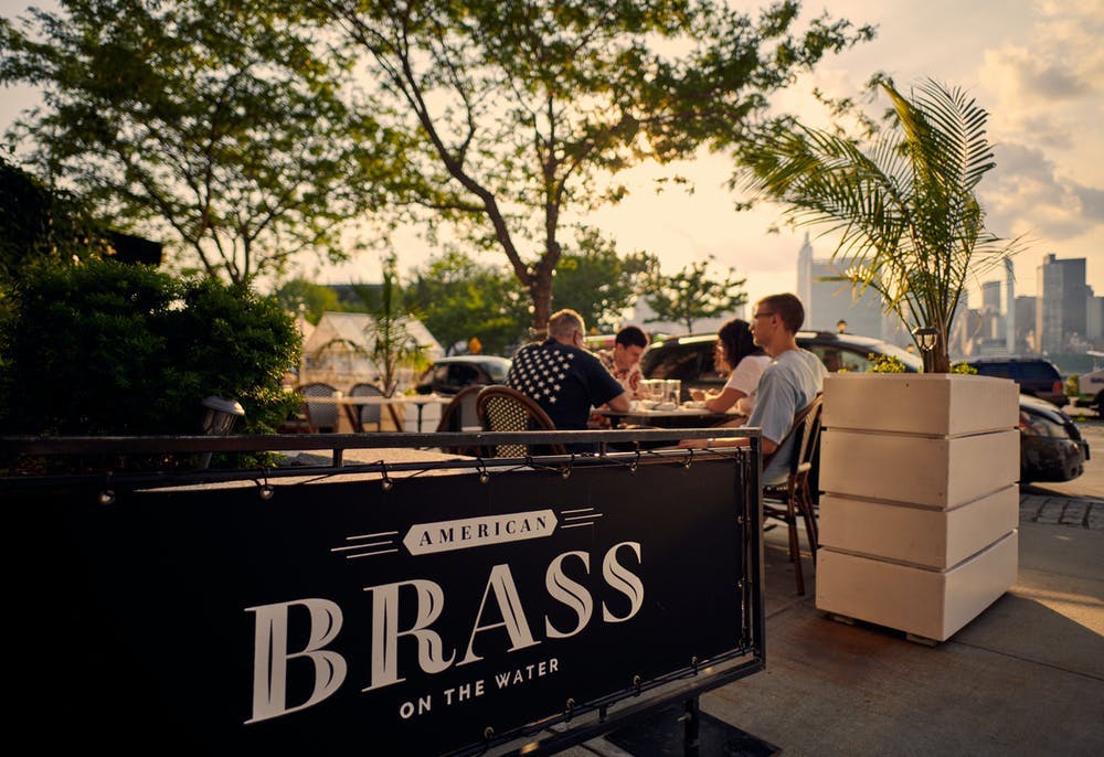 patio dining on the water at american brass lic