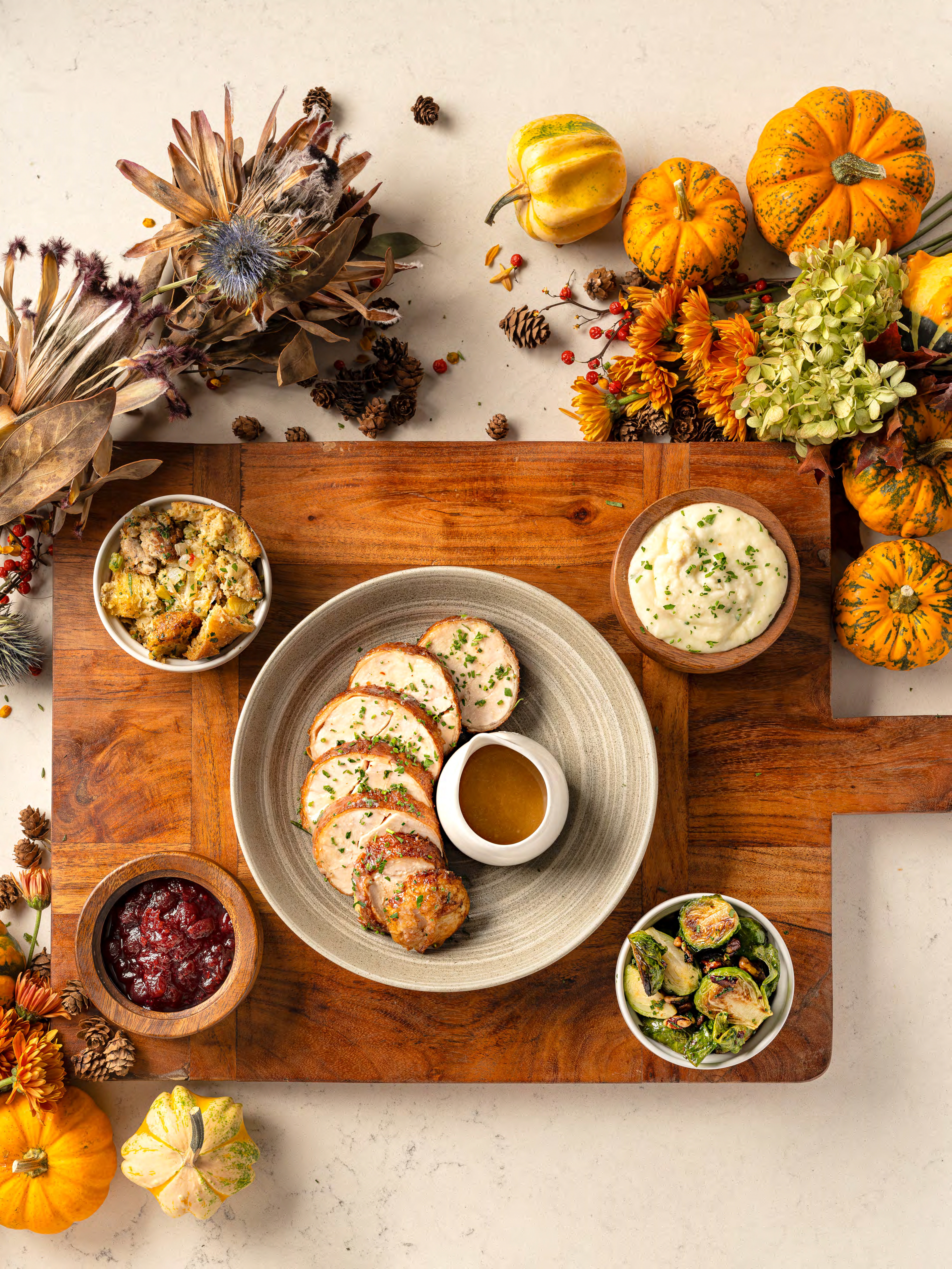 a bunch of food sitting on top of a wooden table