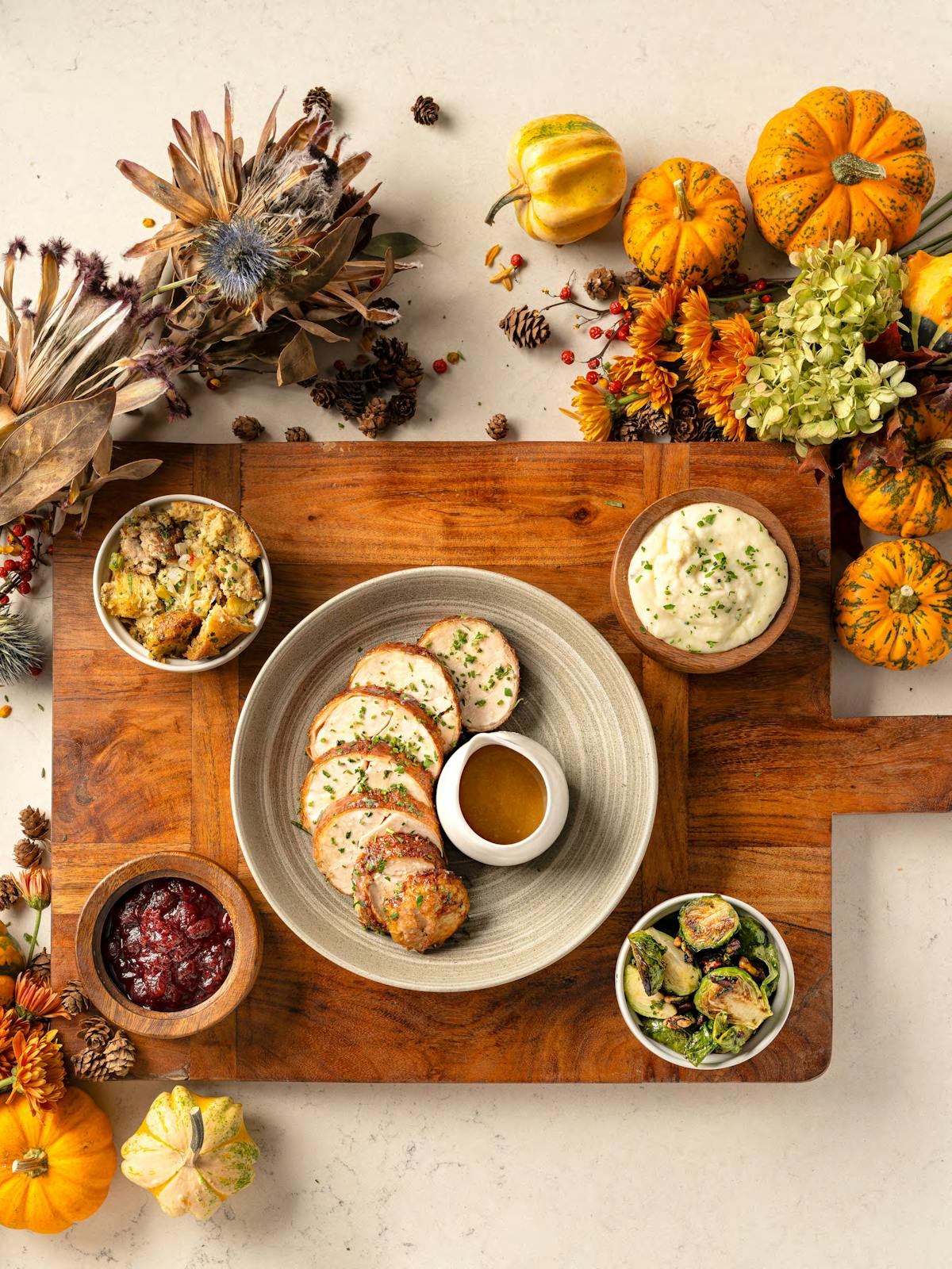 a bunch of food sitting on top of a wooden table