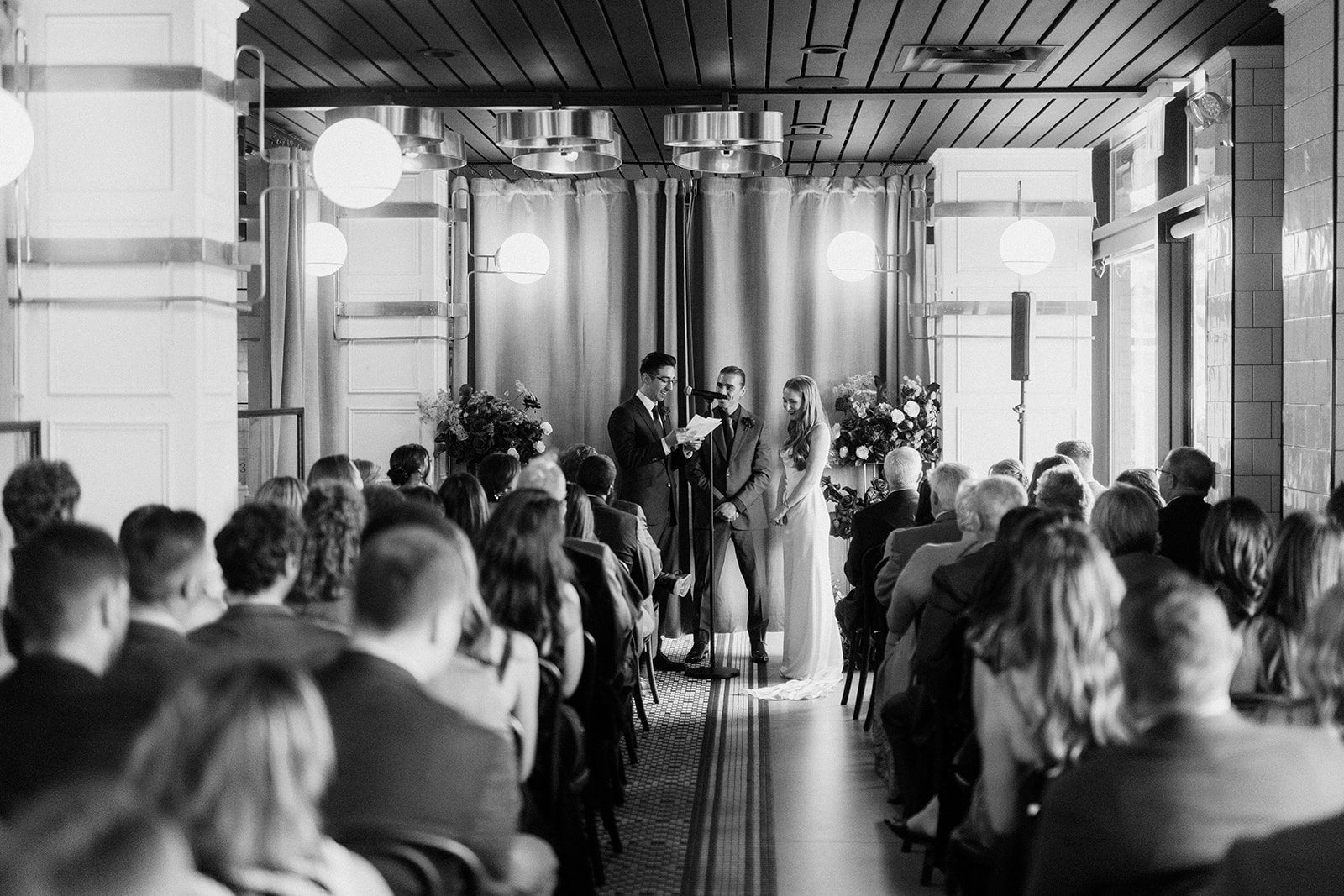 a group of people standing in front of a crowd