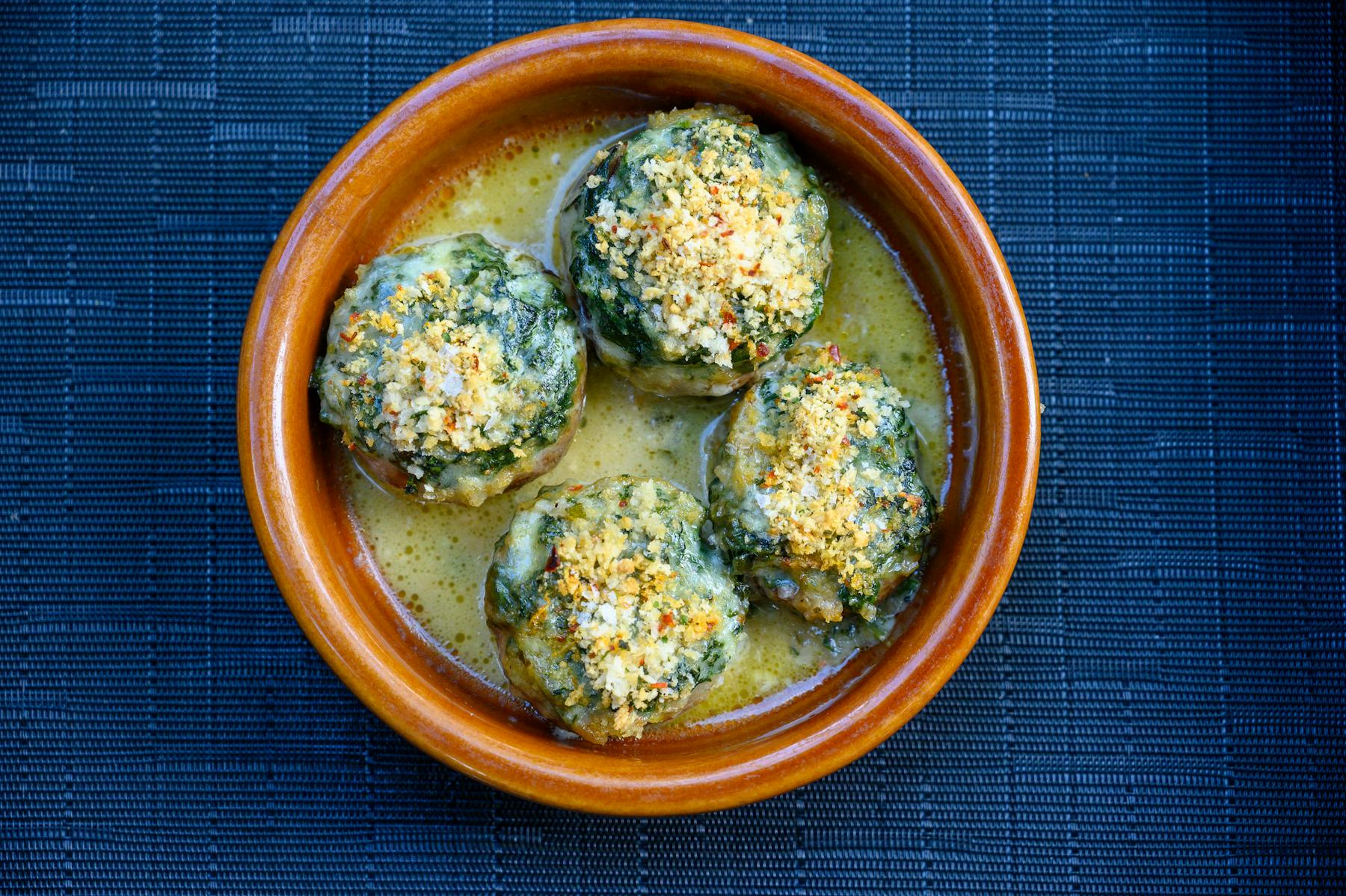a blue bowl filled with food