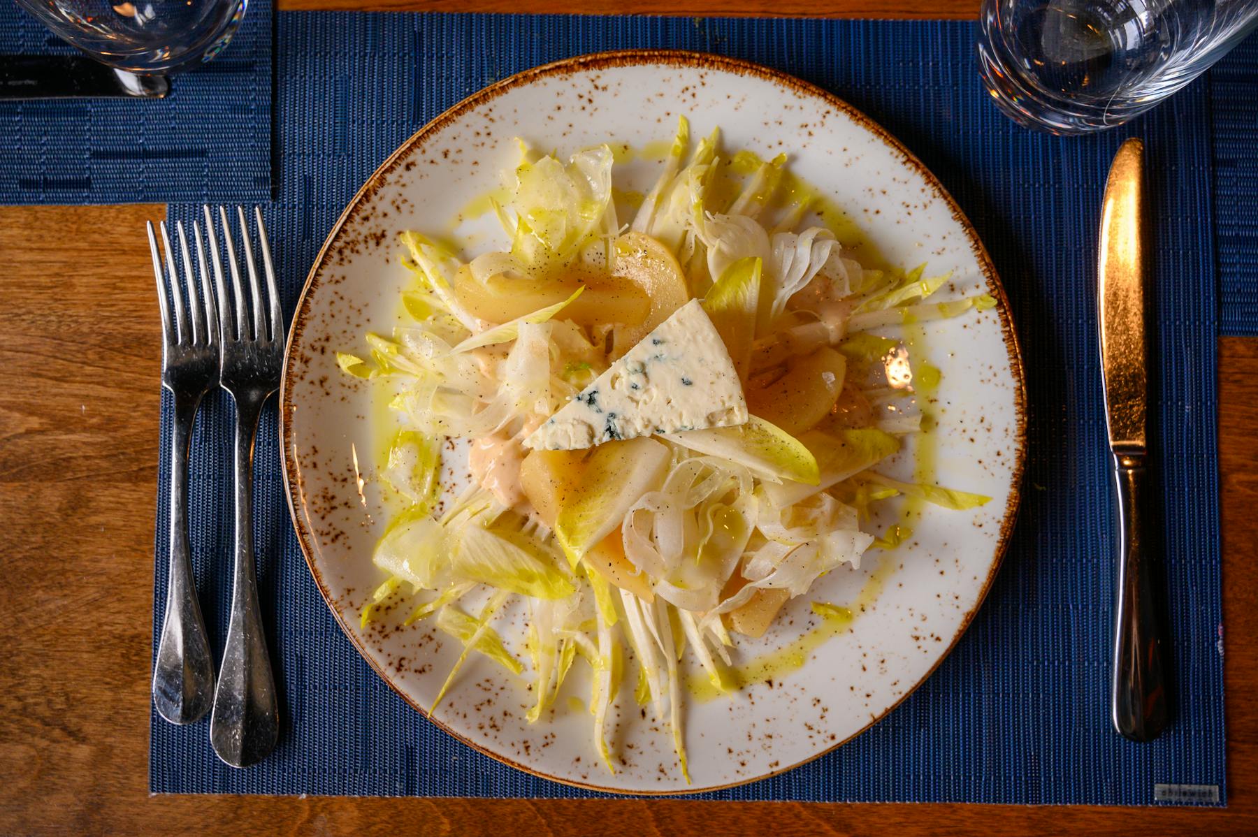 a plate of food with a fork and knife