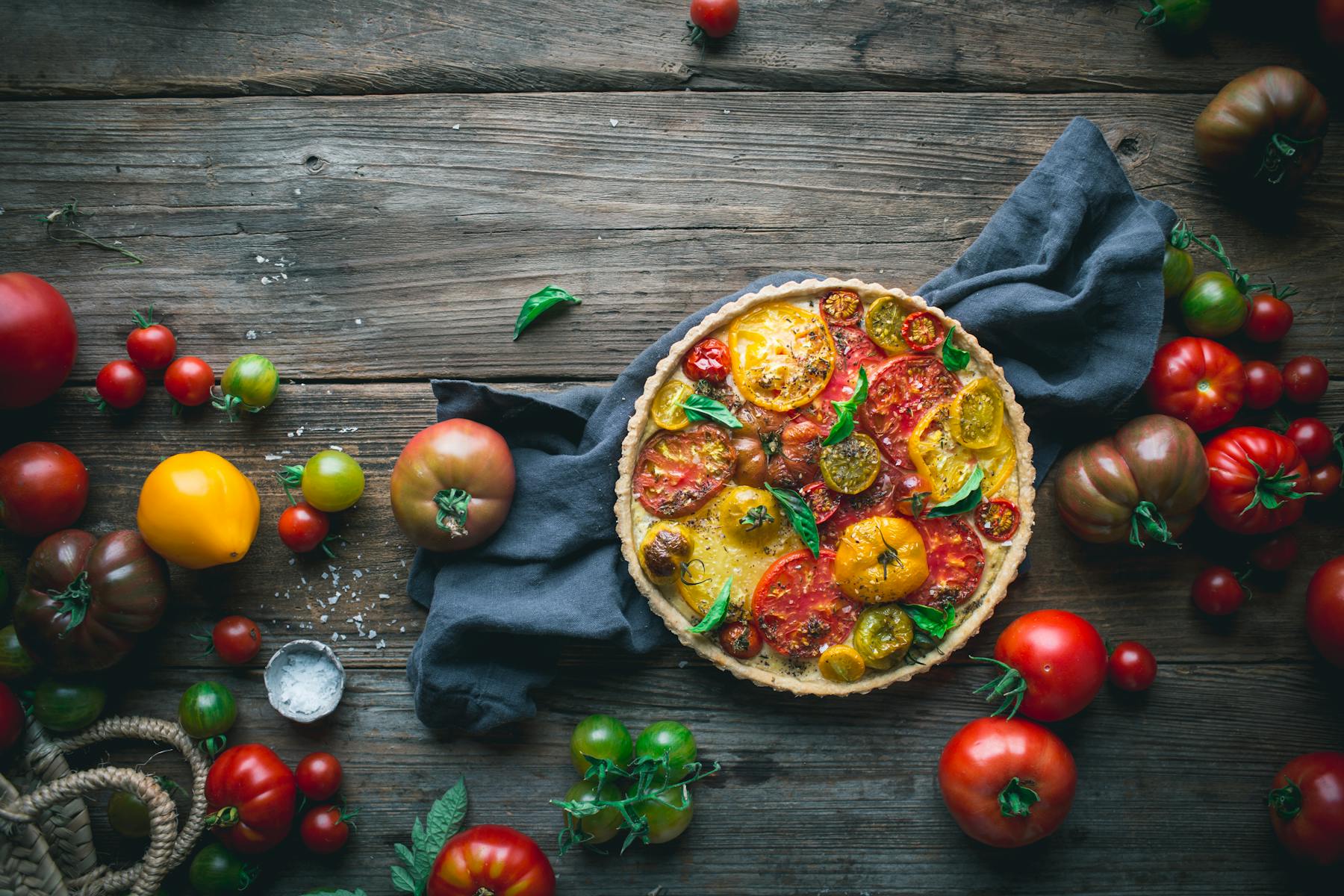 a plate of food and vegetables in a table