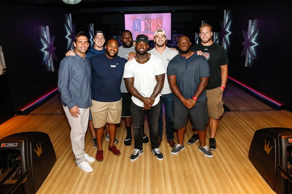 a group of people posing for the camera