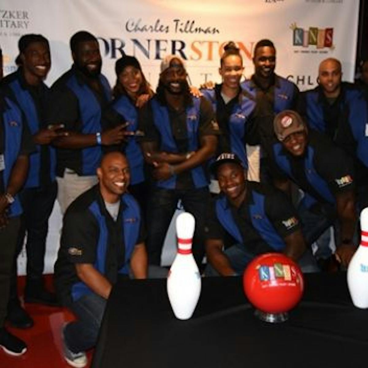 a group of people posing for a photo