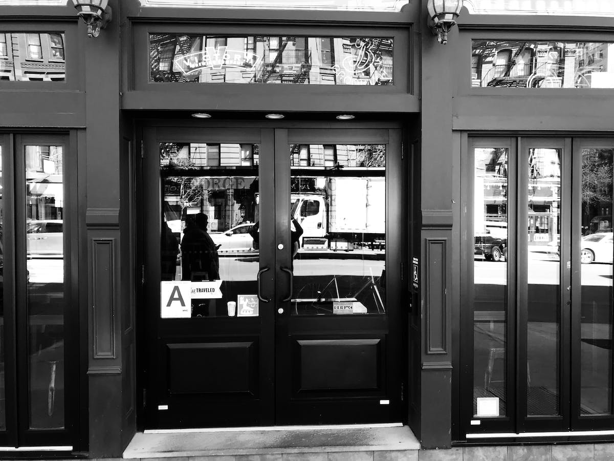 a group of people in a store window
