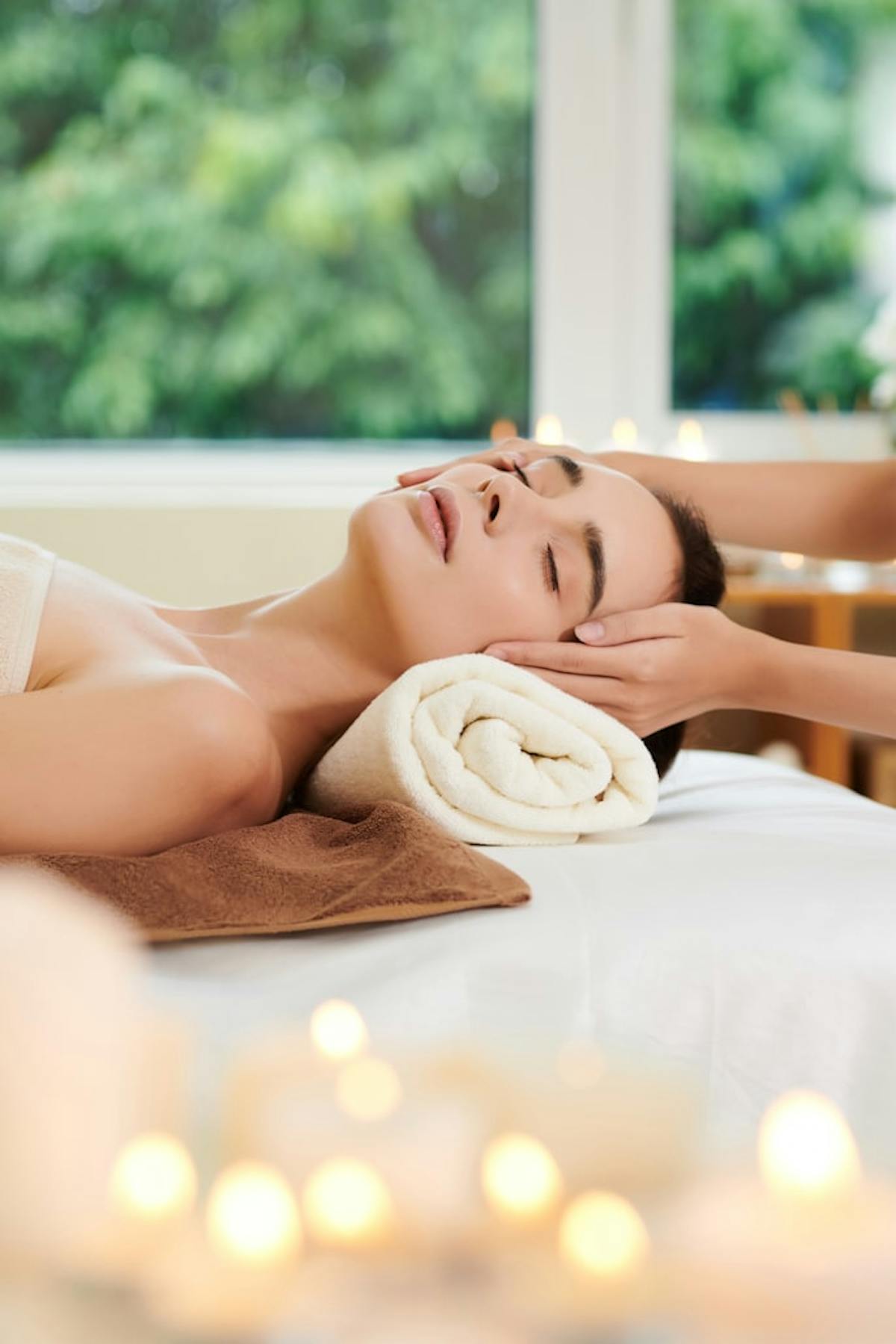 a person sitting on a bed